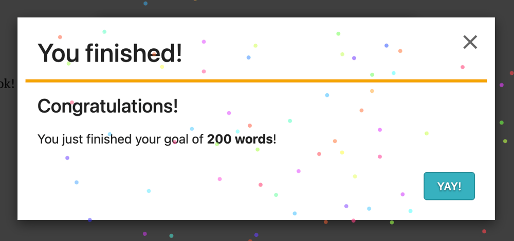 Screenshot of a pop-up box spewing confetti and saying, "You finished! Congratulations! You just finished your goal of 200 words!"