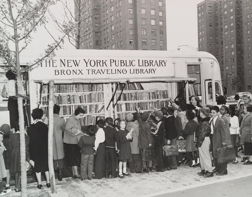 A 1950s photograph of schoolchildren at a New York Public Library bookmobile.