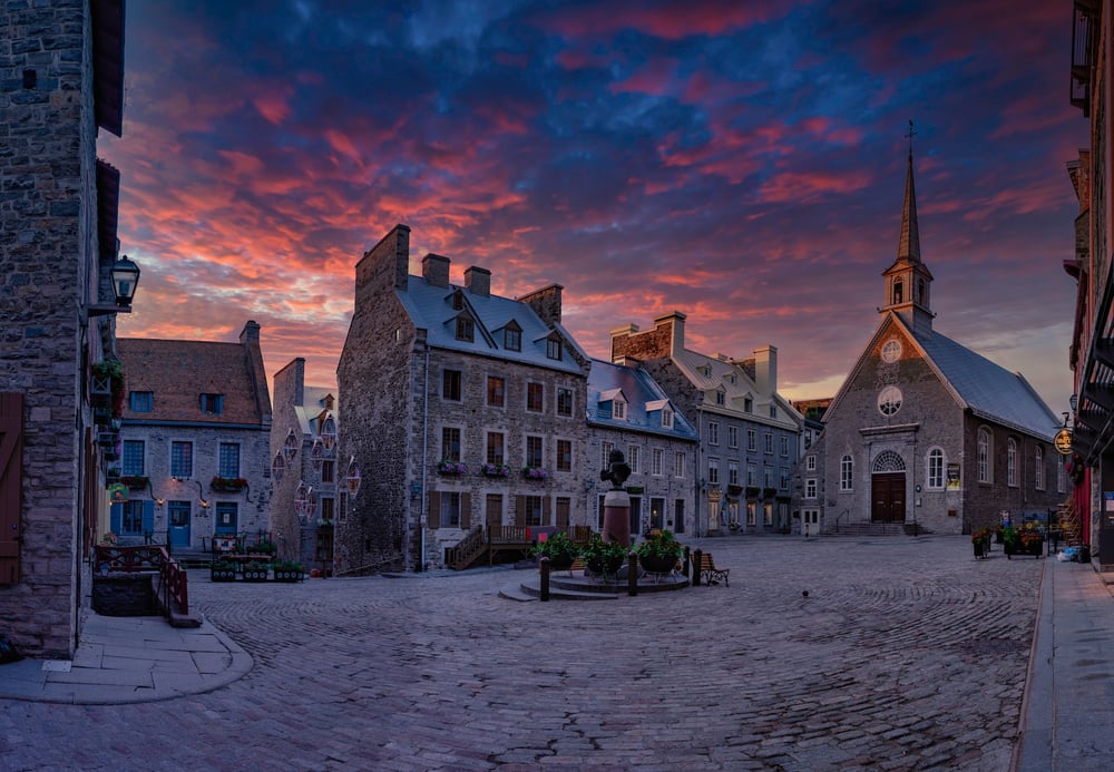 Old buildings in Quebec at dusk.