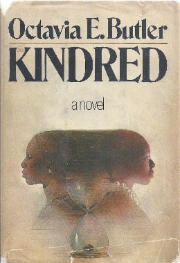The cover of Kindred by Octavia Butler -  cream-colored book with a woman depicted in back-to-back profiles.