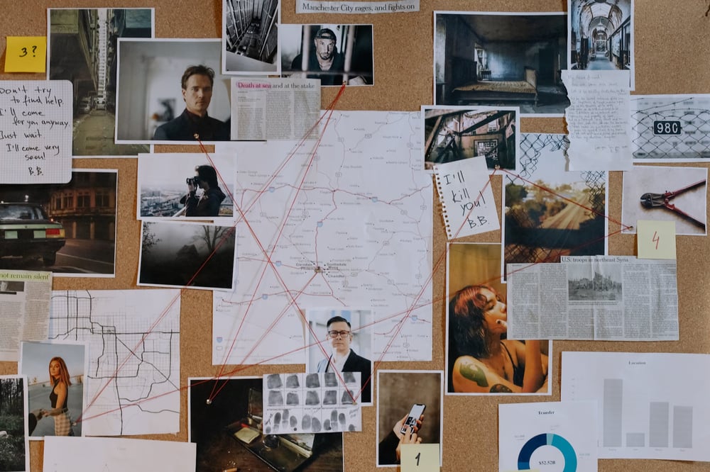 An investigation board with photos, maps, and clues.