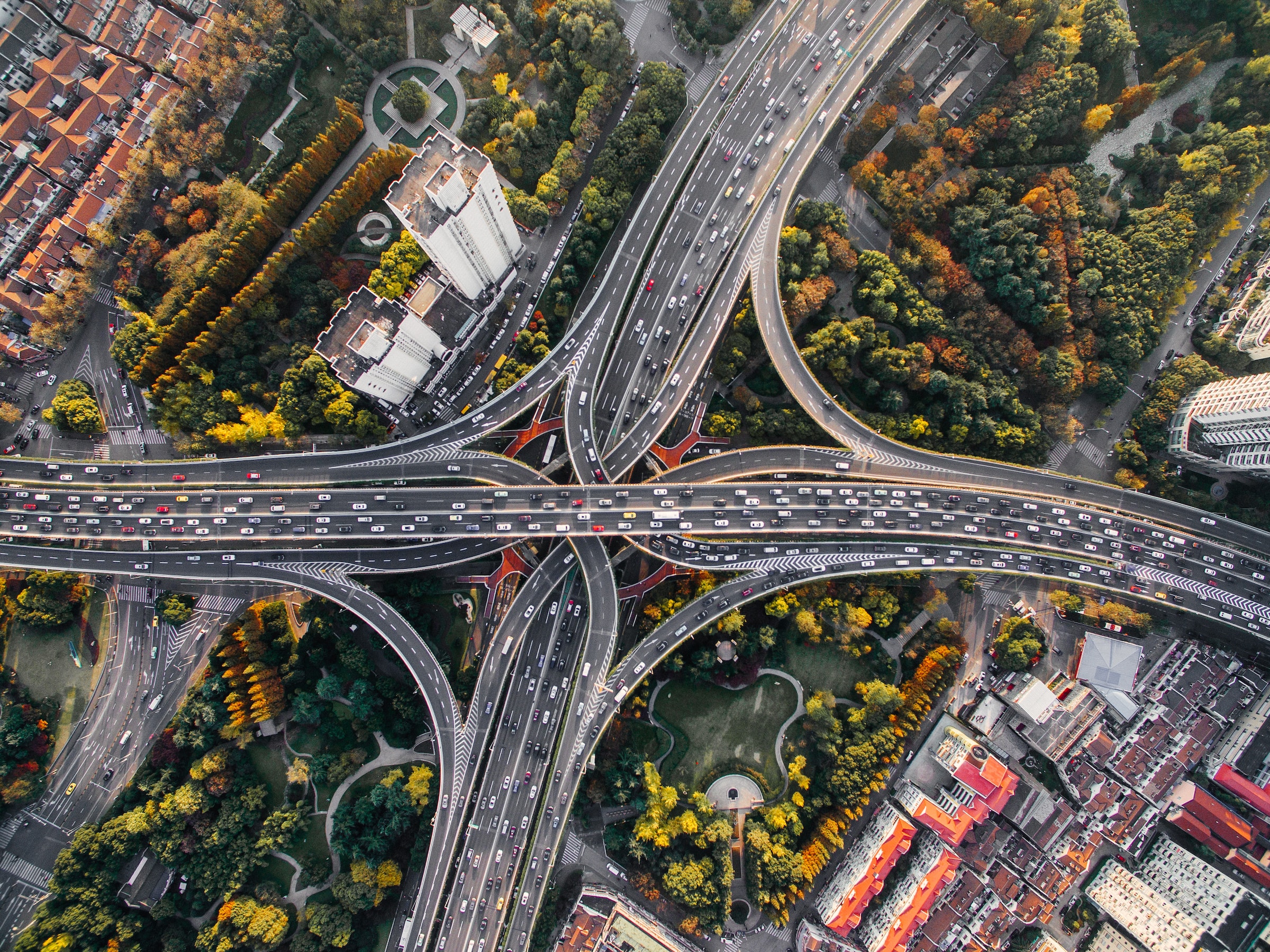 An aerial view of a complicated freeway interchange.