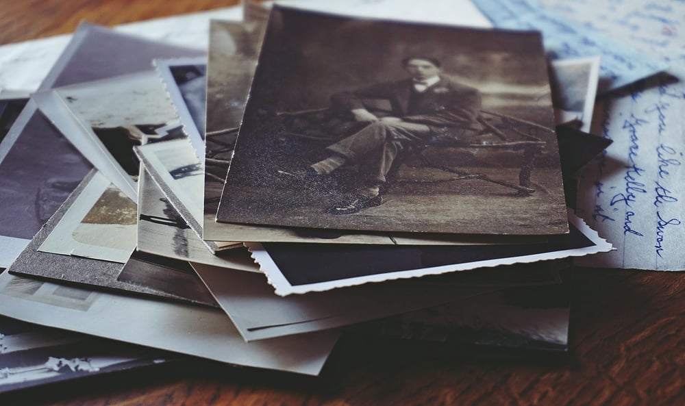 A pile of old photographs and letters.