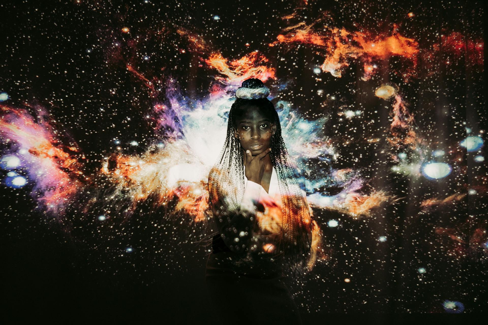 Outer space projected onto a person's face.