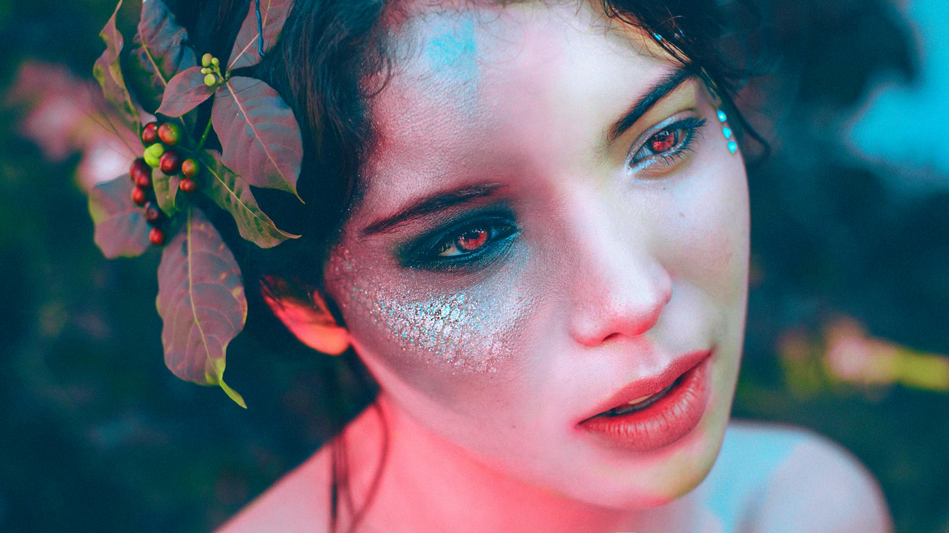 A fairy with red eyes looks concerned.