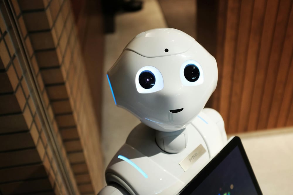 A humanoid robot looking up.