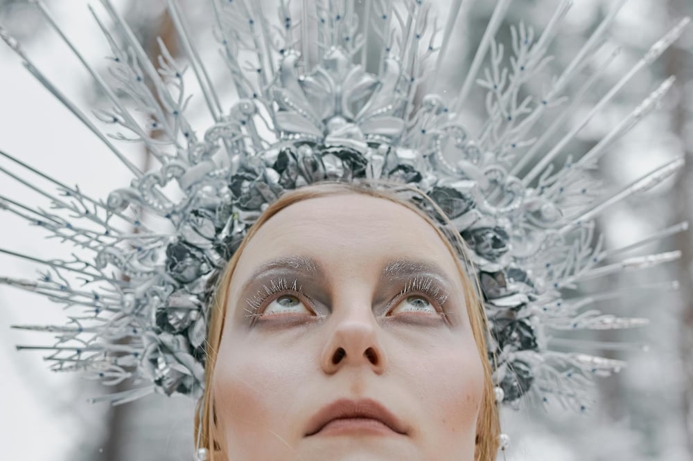 An ice queen wearing an icicle crown.