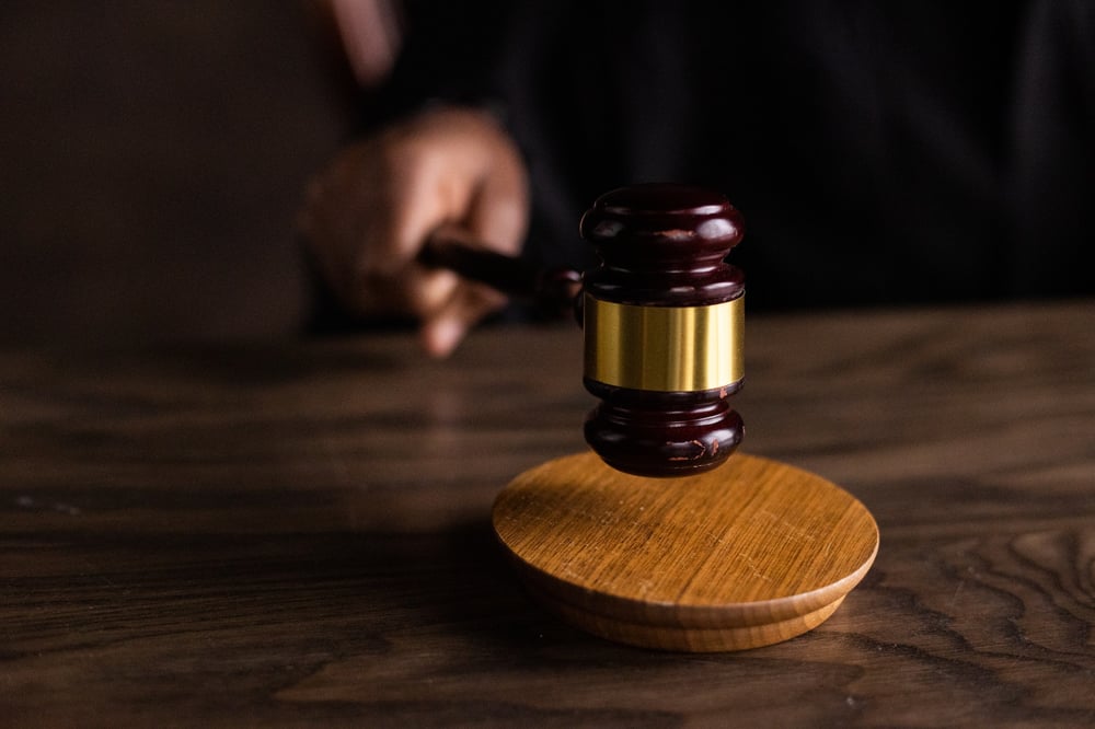 A pounding gavel.