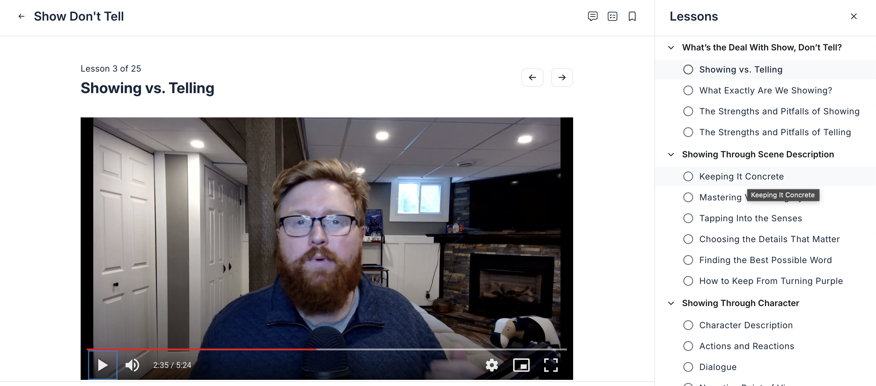 A screenshot of the DabbleU Academy Show, Don't Tell course with a video of an instructor speaking and a list of the lessons on the right side of the page.