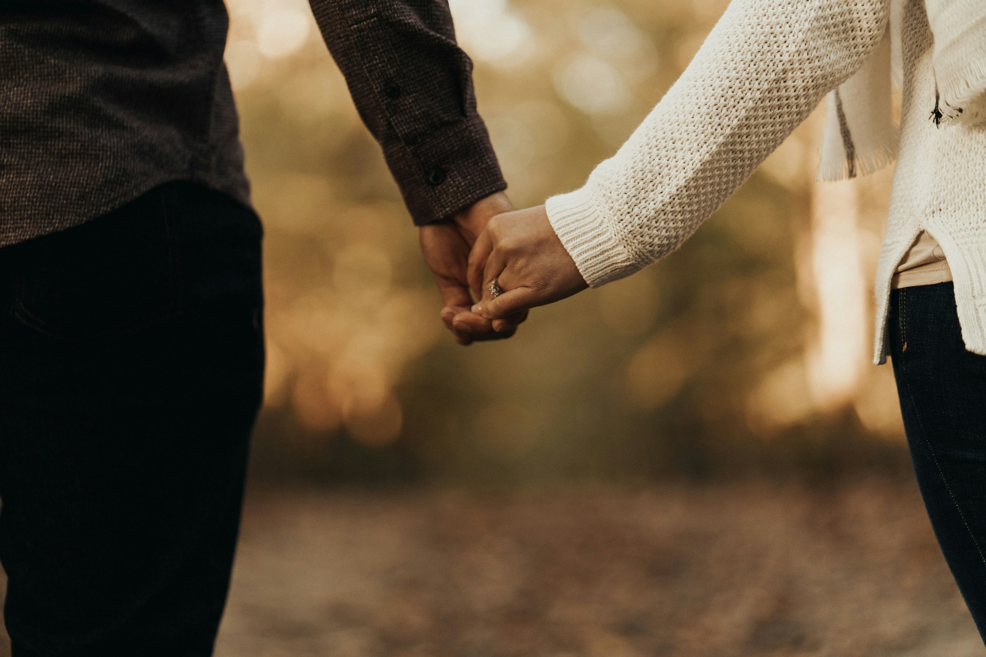 Two people holding hands.