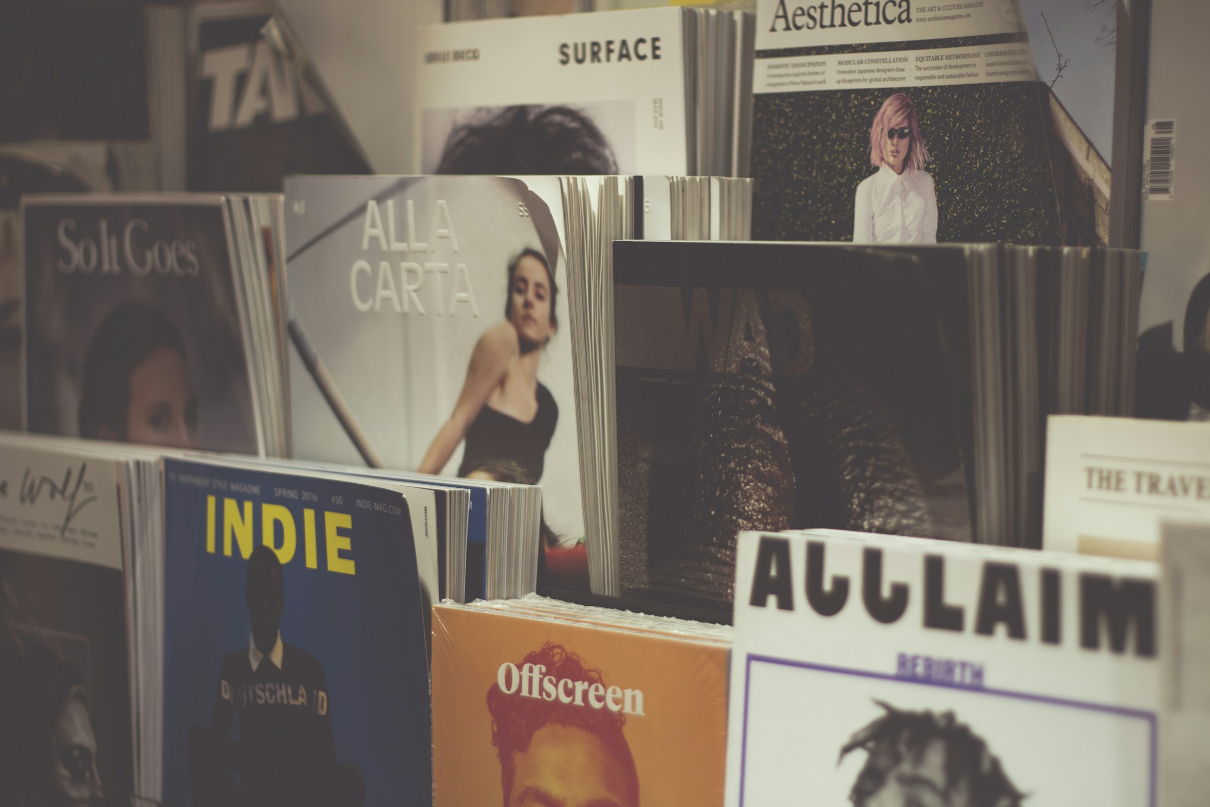 A rack of artsy magazines.