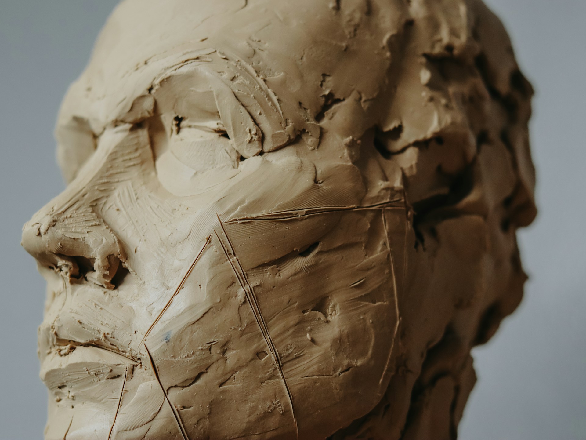 A human head molded out of clay.