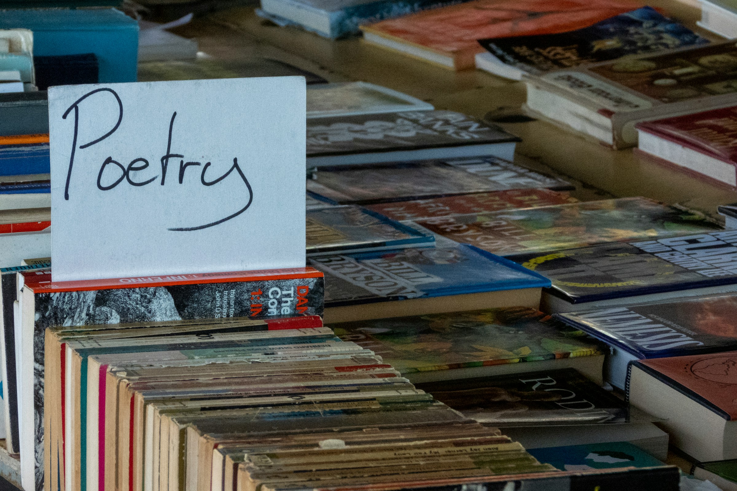 A handwritten sign reading
