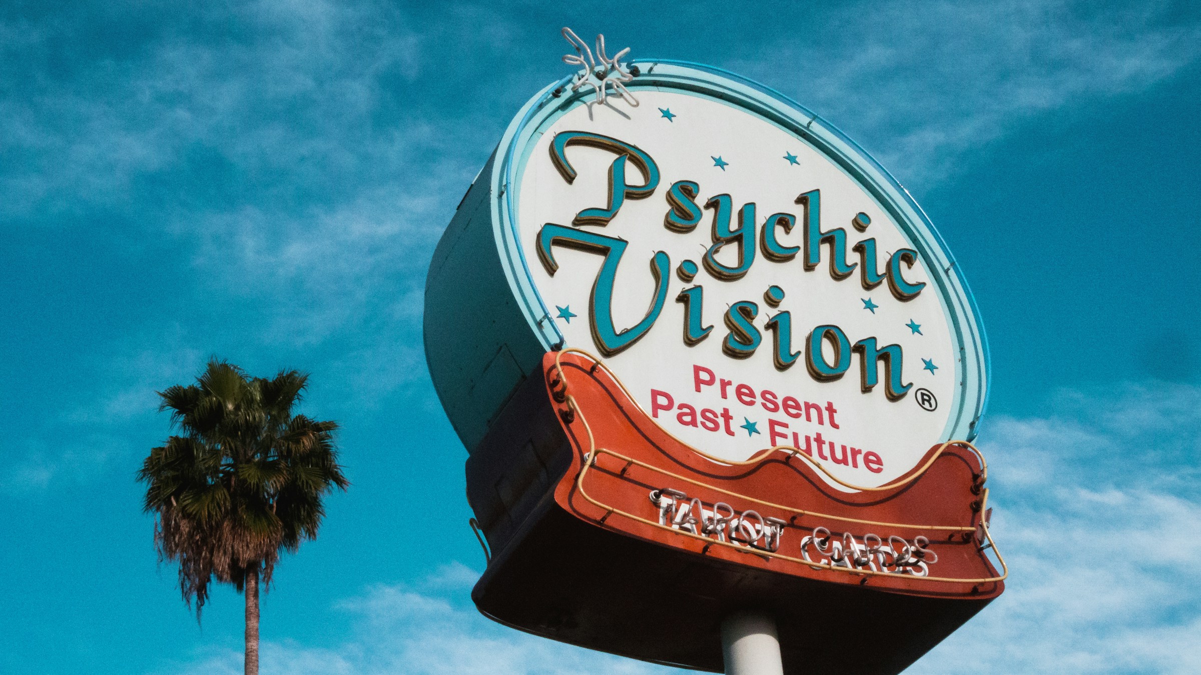 A big retro roadside sign reads